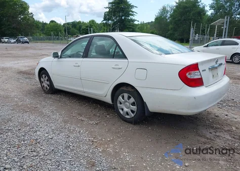 2004 Toyota Camry Le z USA, uszkodzony, nr VIN 4T1BE32K54U342385